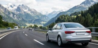 Carte verte assurance auto en Europe : ce que couvre vraiment votre contrat à l’étranger Voiture roulant sur une route de montagne en Europe, illustration assurance auto à l'étranger